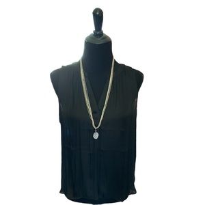 Woman’s Petite large black blouse, sleeveless, polyester, new with tags, sheer